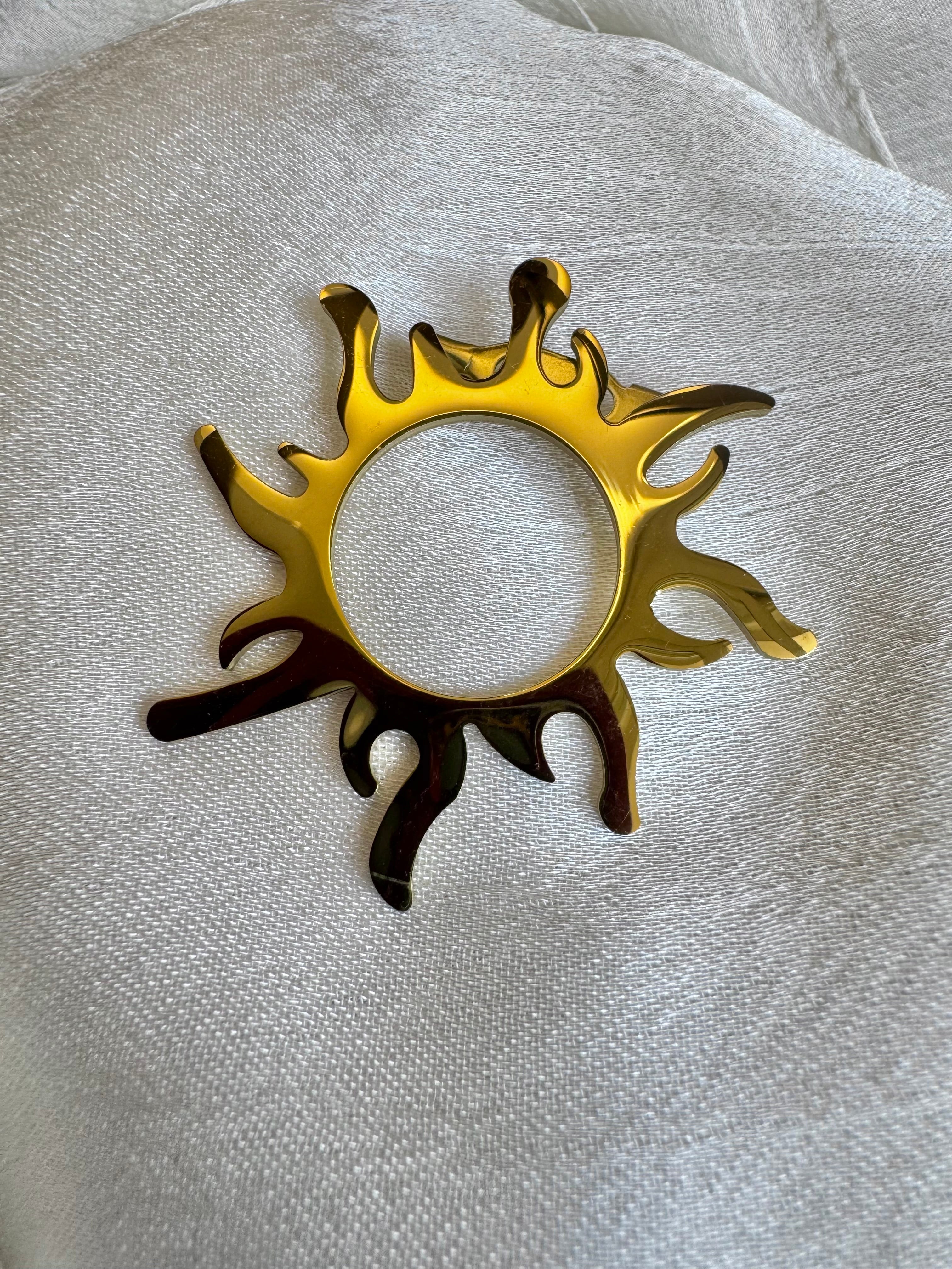 Sun brooch