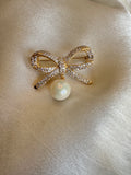 Pearl bow brooch