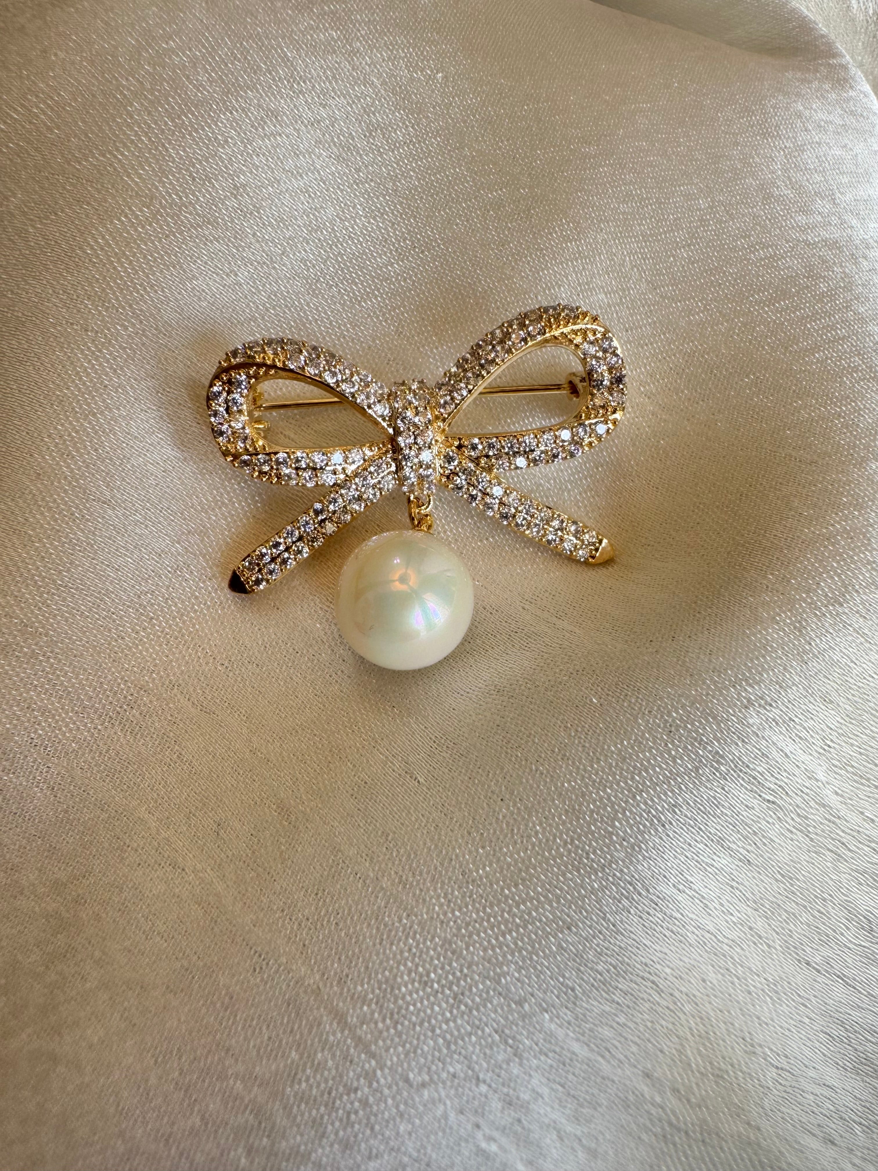 Pearl bow brooch
