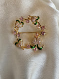 Flower circle brooch